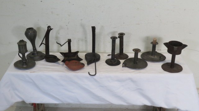 Group of 11 pcs of lighting: Group of 11 pcs of lighting, including: 2 pewter whale oil lamps, grease lamp, candleholders, etc., smaller pewter lamp is 6"T