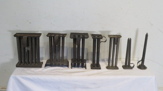 Collection of 7 19th-century tin candle molds (1 of 4)