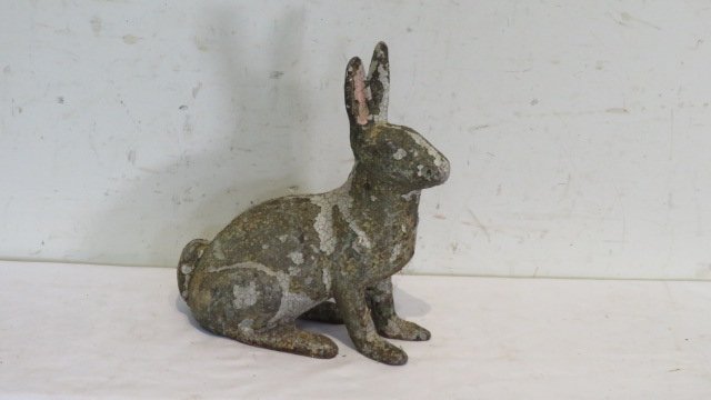 Cast iron rabbit door stop with flaking paint (1 of 4)