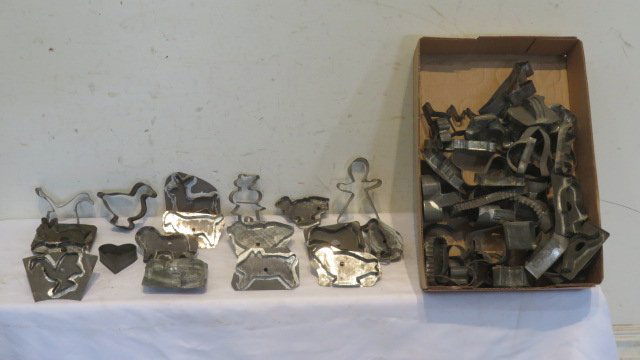 Group of approximately 50 cookie cutters in a splint basket (1 of 4)