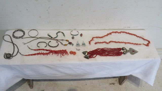 Group of Southwest ladies jewelry: Group of Southwest ladies jewelry including coral necklace, coral and turquoise necklace, a few cuff bracelets, and other miscellaneous jewelry