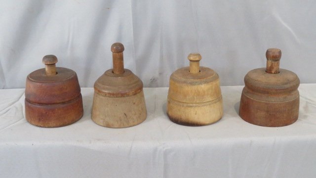 4 one lb. butter molds: 4 one lb. butter molds, including: acorns, sheaf of wheat, fern leaves, and pineapple, tallest is 6.5"T to top of plunger x 4.5"D