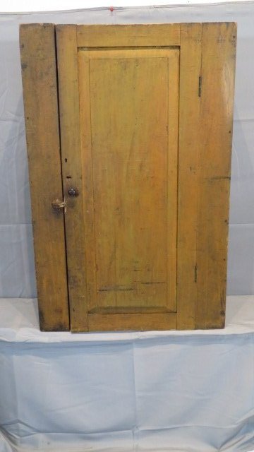 Pine dovetailed case hanging cupboard w/single raised panel door in old mustard (1 of 5)