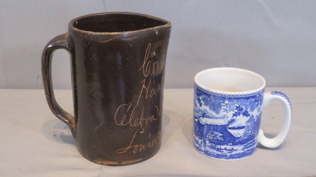 Stoneware Louisville, Ky advertising scratch pitcher (1 of 5)