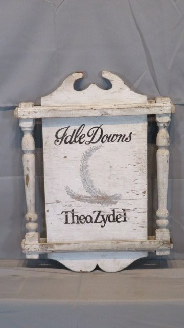 Mid-20th century trade sign for Idle Downs, Theo.. Zydel: Mid-20th century trade sign for Idle Downs, Theo. Zydel, original white paint with black stenciling and gray hand-painted feathers, 2-sided, 27"T x 19.5"W x 2.5"D