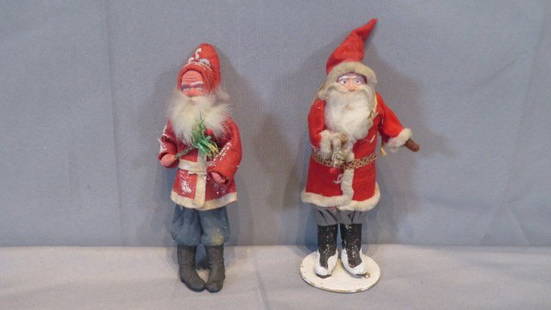 2 felt suit vintage Santas: 2 felt suit vintage Santas with papier-mache faces, one has a backpack and the other has a little feather tree, 8"T