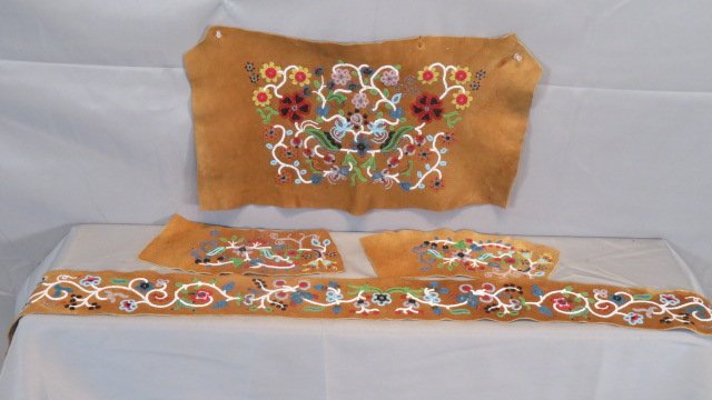 4 pieces of crewel type beadwork: 4 pieces of crewel work type of beadwork on heavy felt, largest pieces are 12" x 21" and 4" x 60"