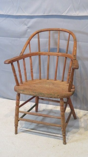 Late 19th century Windsor armchair: Late 19th century Windsor armchair with traces of old red paint, spindles are mortised through the top rail, 35"T x 21"W x 16"D, seat height is 18"T