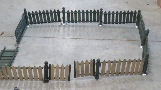 Early 20th century wood Christmas tree fence: Early 20th century wood Christmas tree fence, 35" x 25" as shown in photo, posts are 6"T, fence is 5"T, short 2 green posts, includes 4 larger posts that don't match, one extra piece of fence that cou
