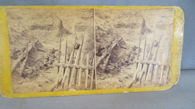 Stereo view of dead rebel at Fort Mahone: Stereo view of dead rebel at Fort Mahone, published by E & H T Anthony of New York, 3.5"T x 7"W