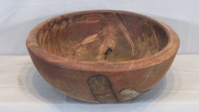Heavy burl wood bowl: Heavy burl wood bowl in old grungy surface with old metal make-do repairs, double stripe cut into top edge, 14"diam x 5.5"deep