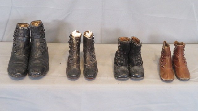 4 pairs of child's leather button shoes: 4 pairs of child's leather button shoes, largest pair is 5.25"T x 8"L and says size 5 on the sole