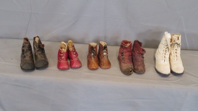5 pairs of late 19th century children's shoes: 5 pairs of late 19th century children's shoes, 3 pairs of button, and 2 pairs of lace up, largest pair is 5"T x 7"L