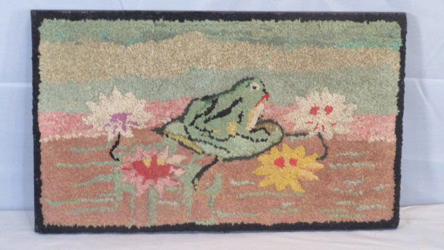 Early 20th century hooked rug with frog on lilypad on frame (1 of 3)