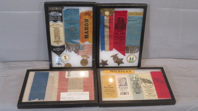 4 frames of GAR memorabilia: 4 frames of GAR memorabilia includes badge & ribbon from Knox, Iowa, 3 ribbons from Illinois, 5 ribbons from Michigan, one from Pa. and one from NJ, other buttons and badges etc. frames are 8" x 12"