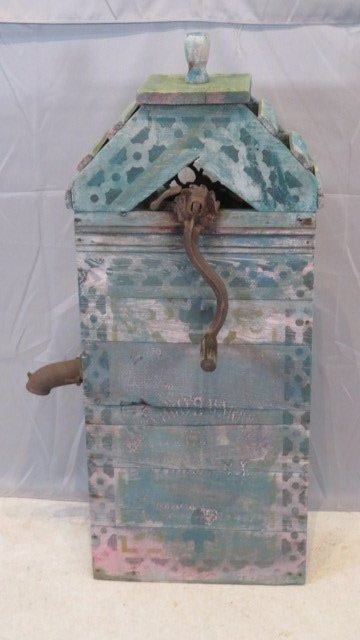 Wood and iron water pump: Late 19th, early 20th century wood and iron water pump with worn old green paint and stenciling, signed Barr Bros., Ithaca, NY, 43"t. x 18" not including iron spigot on side, x 8" not including crank