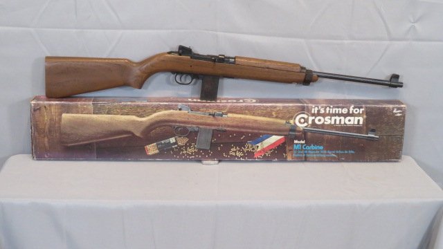 Crosman M1 Carbine repeating 22-shot BB gun new in box: Crosman M1 Carbine repeating 22-shot BB gun new in box, includes manual, pamphlet with dealers that service listed, unopened package of BB's, and an unopened tube of silicone, walnut stock, original s