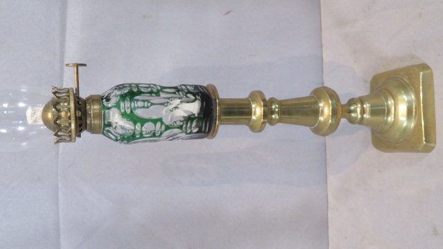 Green cut to clear Sandwich Glass peg Lamp: Green cut to clear whale oil peg lamp converted kerosene with 19th century brass candlestick with push up, label on lamp font "The Levine Collection", 14"T (to top of burner)