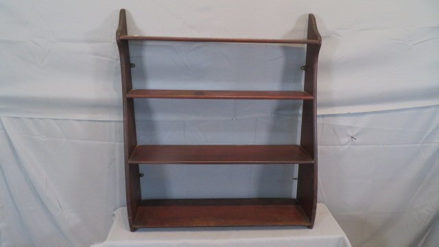 Early 19th century walnut New England whale end hanging shelf: Early 19th century walnut New England whale end hanging shelf in original surface, shelves are mortised into the sides, 37"T x 32.5"W x 5.5"deep (top shelf) and 9"deep (bottom shelf)