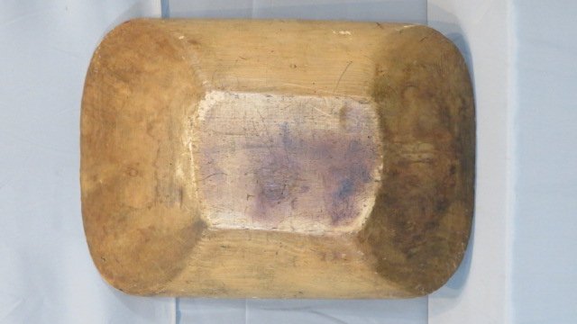 Large wood trencher in natural surface (1 of 3)