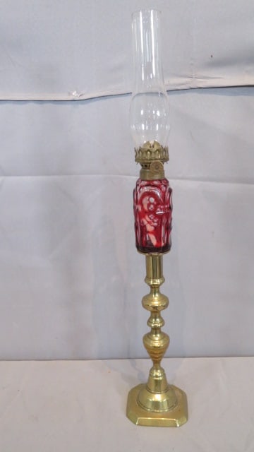 19th century ruby cut to clear Sandwich glass whale oil peg lamp conv. to kerosene: 19th century ruby cut to clear Sandwich glass whale oil peg lamp converted to kerosene in a 10" brass beehive candlestick w/push-up, 16"T (to top of burner)