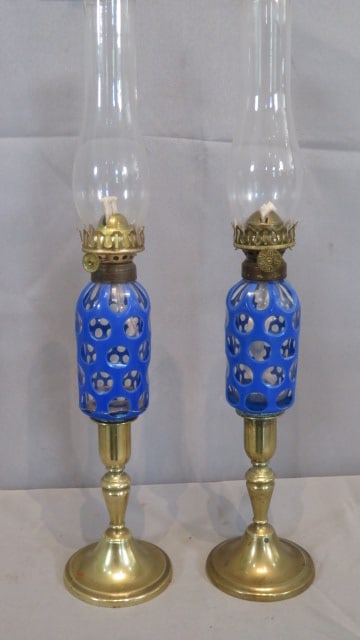 Pair of 19th century blue overlay Sandwich glass peg lamps: Pair of 19th century blue overlay Sandwich glass peg lamps whale oil converted to kerosene, 12"T (to top of burner)