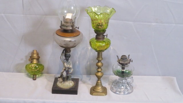 Group of lighting, lamp with black boy figure, finger lamp, peg lamps (1 of 9)