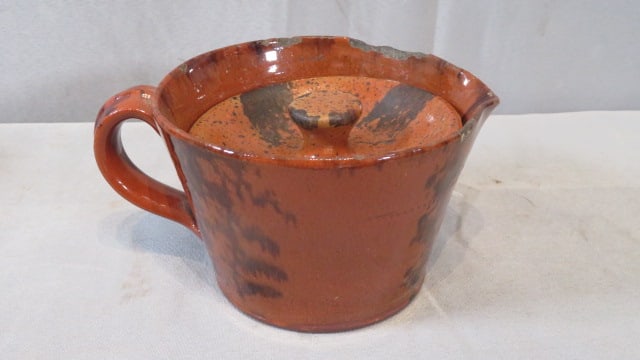 19th century redware pitcher with lid with orange glaze and black decoration (1 of 7)