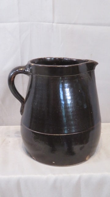 Late 19th century stoneware pitcher with Albany glaze (1 of 6)