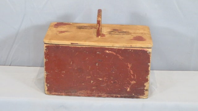 Pine carrier with lid and original red paint: Late 19th century pine carrier with handle and lid in original red paint, 11 1/2" top of handle, x 14" x 8 1/4", nailed construction
