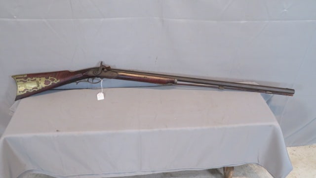 19th century cap and ball half stock rifle: 19th century cap and ball half stock rifle with a tiger maple stock in old surface and a patch box, barrel is signed Albany (NY), lock has some engraving with no marking, brass hardware, octagon barre