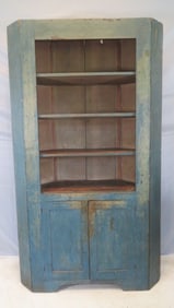 Early 19th century poplar open-top corner cupboard in old blue paint