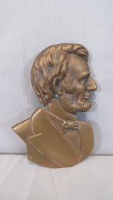 Bronze plaque of Abraham Lincoln marked Springfield, IL