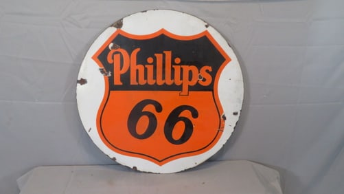 2-sided porcelain round Phillips 66 sign in orange/black and white edges