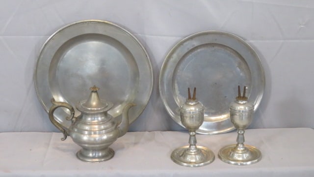 5 pieces of 19th century pewter: 5 pieces of 19th century pewter includes 13 1/2" & 15" chargers with London touchmarks, 2 unsigned 9" whale oil lamps with burners and an unsigned American teapot, provenance from the estate of the la