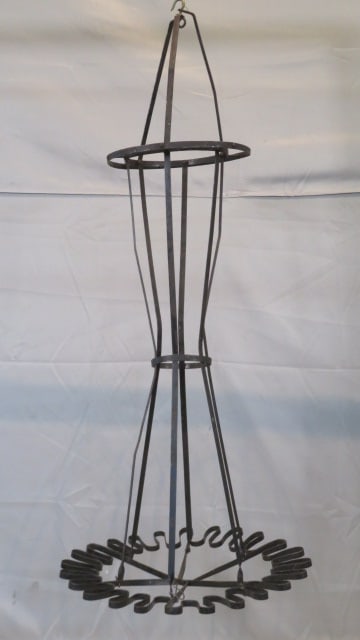 Unusual tin general store hanging broom holder (1 of 4)