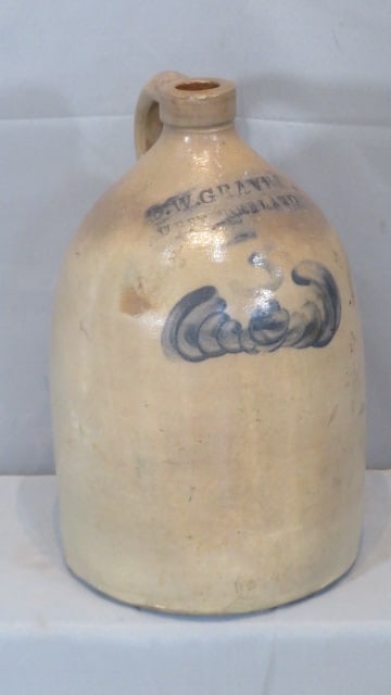 D.W. Graves stoneware jug: 3 gal. stoneware jug marked D.W. Graves, Westmoreland with some blue decoration, 16" x 9" dia.