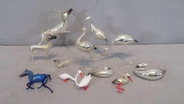 12 blown glass animal Christmas ornaments: 12 blown glass animal Christmas ornaments including 9 mercury glass with a 5" x 6" stag deer and 2 smaller deer all have Made in Germany paper labels also 6 storks, herons and geese, a blue horse and 
