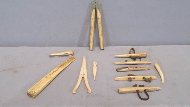 Collection of handmade bone artifacts: Collection of handmade bone artifacts, including a Stanley #87 folding rule 6"L (when folded), 6 shucking pegs, a folk-art toothpick with a carved face, curling irons, a busk signed C. St. John, and a