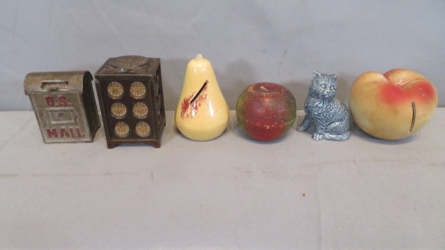 Group of 6 still banks, 2 iron and 4 pottery (1 of 16)