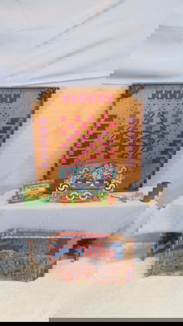 Group of 6 vintage games and toys: Group of 6 vintage games and toys, including a carom game board 29"square, a tin shooting gallery game with original box made by Wyandotte Toys, Uncle Wiggly game in original box, a cap gun marked Smo