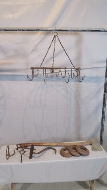 Group of 8 primitives, iron pot rack, axe, iron rings (1 of 7)
