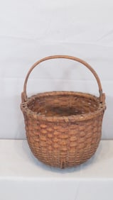 Early swing handle splint basket