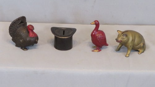 4 cast iron still banks