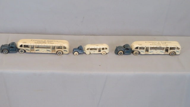 3 Arcade cast iron "Century of Progress" Greyhound shuttles: 3 Arcade cast iron "Century of Progress" Greyhound shuttles, 2 are 10.5"L, one is dated 1933 and the other is dated 1934, smaller one is undated