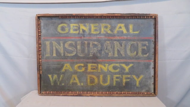 Tin advertising sign: Tin advertising sign for General Insurance Agency, W.A. Duffy, wood frame, 2 sided but one side illegible, 26" x 38" x 2 1/2"