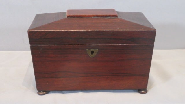 19th century rosewood tea caddy: 19th century rosewood tea caddy, has 2 compartments with lids, 5.5"T x 8.25"W x 4.75"D