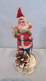 Early 1900's papier-mache Santa w/felt suit