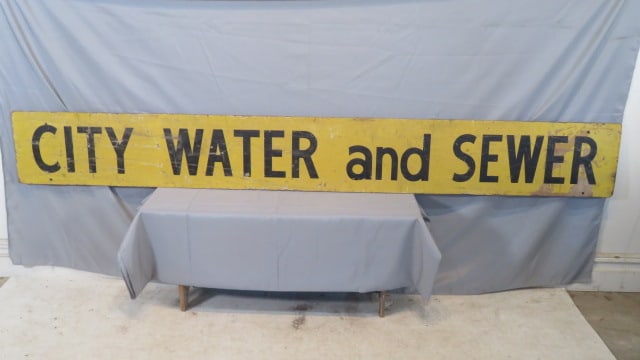 Mid-late 20th century plywood sign, City Water and Sewer: Mid-late 20th century plywood sign, City Water and Sewer, 12"T x 96"L