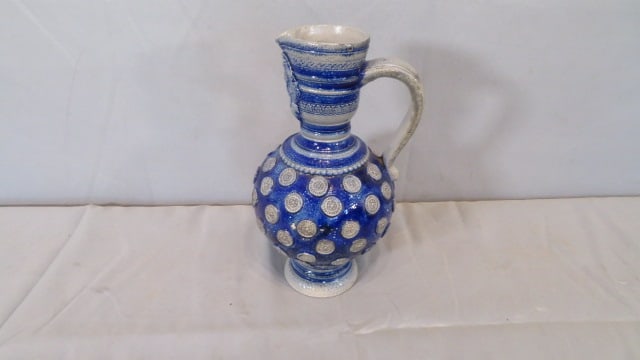 18th century Westerwald pitcher: 18th century stoneware Westerwald pitcher with face on lip, 10 1/2't. x 5 1/2" dia.